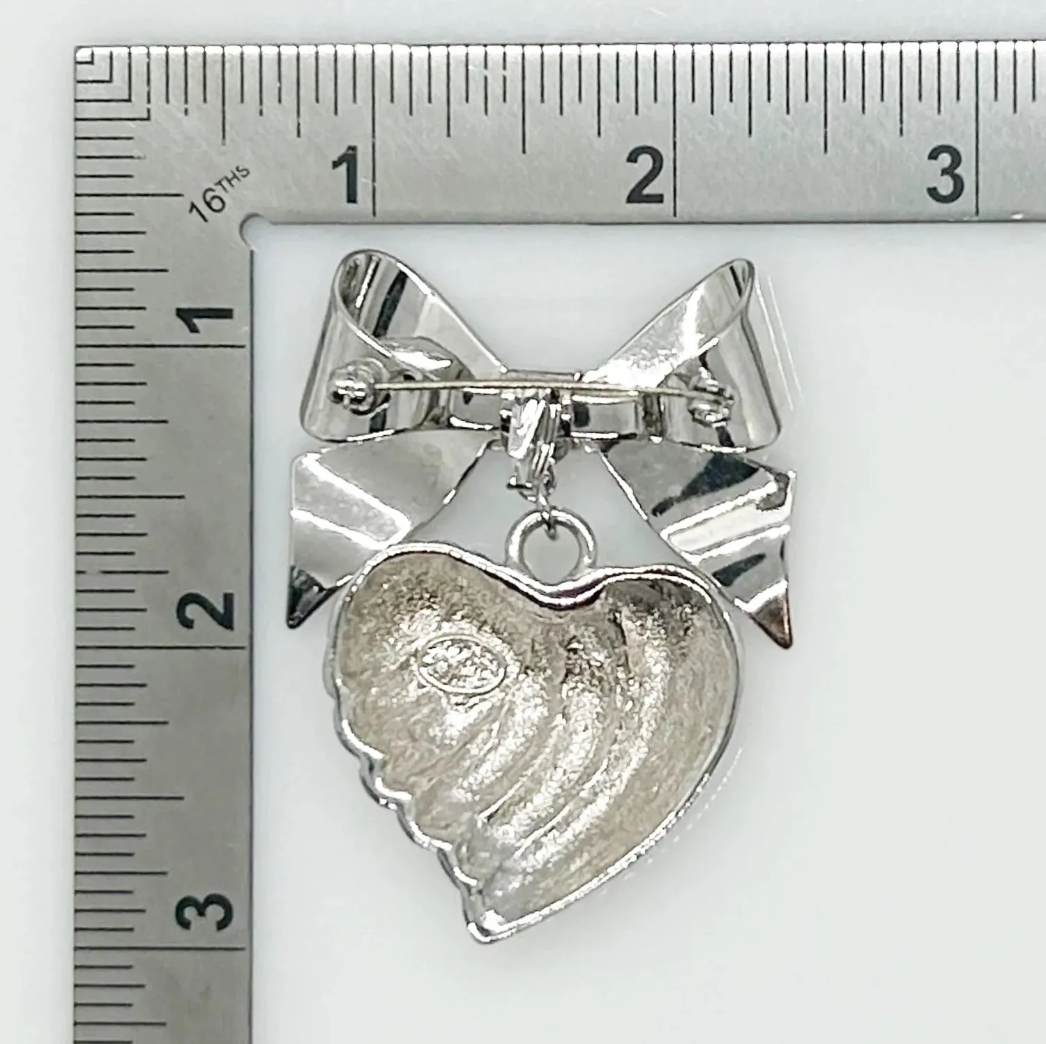 KJL Silver Tone Puffed Heart and Bow Brooch