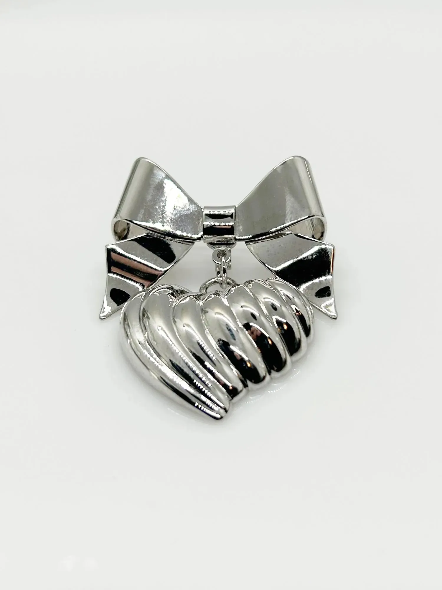 KJL Silver Tone Puffed Heart and Bow Brooch